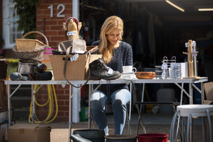 front-view-woman-garage-sale
